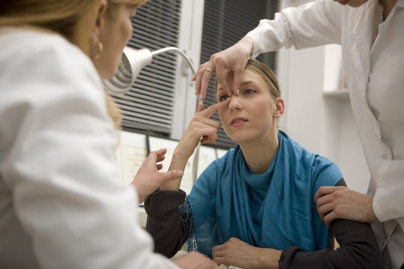 woman-undergoing-nose-exam